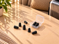 Bouchons d’oreilles noirs avec étui de rangement